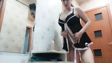 sucking dildo on the doorstep