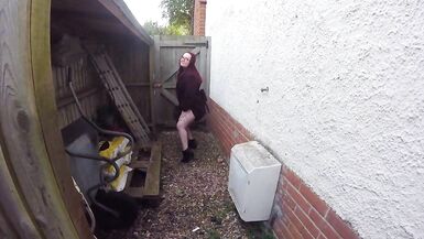 Chubby redhead in the Yard in Ankle boots and coat - 2 image