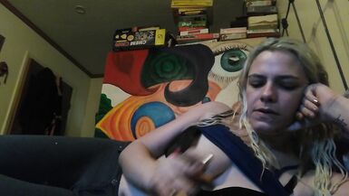 Hot blonde smokes clove cigarettes, plays on phone and plays with tits - 10 image
