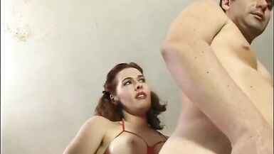 Strict mistress with big natural boobs and red hair gives he