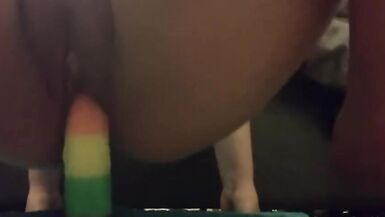 MILF riding rainbow dildo - 11 image