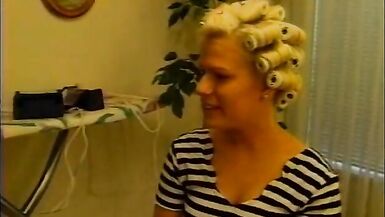 Blonde mulf sucks down a huge cock on her knees