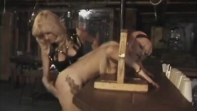 Dominatrix ladies in leather dominate a guy with toys - 13 image