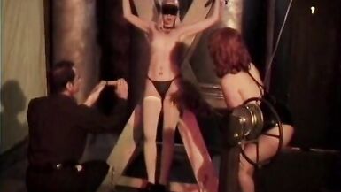 Sexy blonde is bound in red and has clamps applied by sadist - 7 image