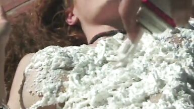 Couple get covered with whipped cream and lick each other - 4 image