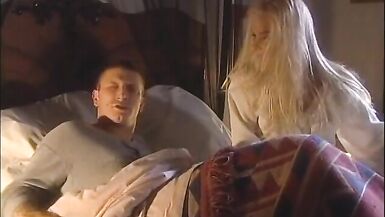 Sexy blondie gives a huge cock a blowie on the big bed - 3 image