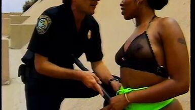 Slutty ebony babe banged by dirty policeman - 1 image