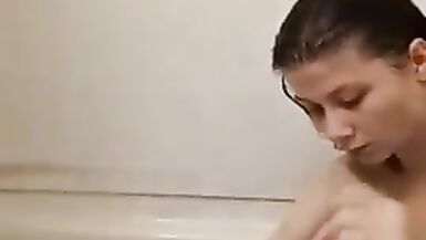 shaving my sexy legs with pink disposable razor - 4 image