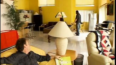Slut in striped stockings takes two cocks in the living room - 1 image