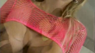 Guy fucks two hot chicks in pink and green fishnets in room - 14 image