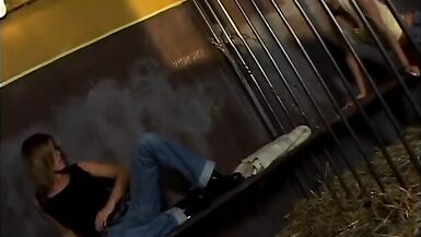 Hot blonde and brunette get horny while in jail and fuck with a strap on - 2 image