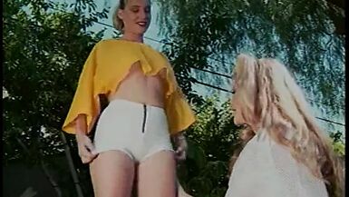 Slutty blonde bends over and gets her girlfriend to stick her tongue in pussy - 1 image