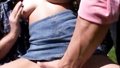 Two guys bang brunette on park bench - 3 image
