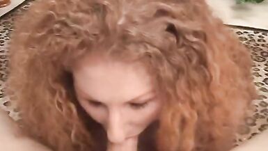 Red haired slut give a blowjob to a cock - 5 image