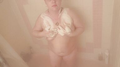Sexy brunette MILF sneaks in a few orgasms and a couple cigarettes in the shower... almost caught! - 6 image