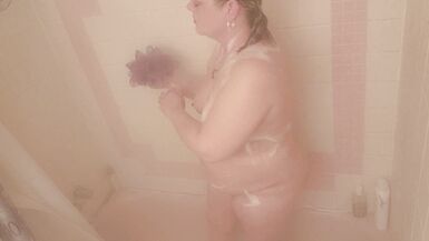 Sexy brunette MILF sneaks in a few orgasms and a couple cigarettes in the shower... almost caught! - 7 image