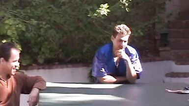 Horny black haired beauty sucks and fucks four men by the pool - 2 image
