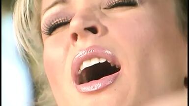 Sexy lesbians muff diving on the grass - 1 image