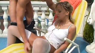 Naughty blonde with curly hair likes when her boyfriend uses strap-on before he drills her at the sundeck - 5 image