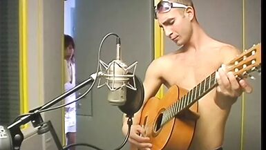 Lucky guitar player gets sucked by brunette before stuffing her wet pussy - 1 image
