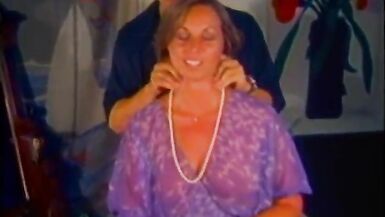 Lusty MILF with hot body slurps and strokes fat cock on zebra skin couch