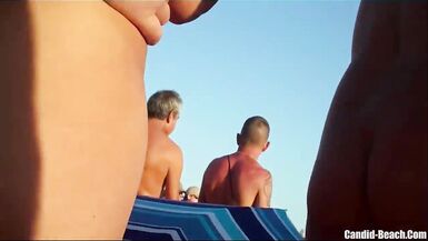 Horny Milfs Nudist getting fingered on the beach - 5 image