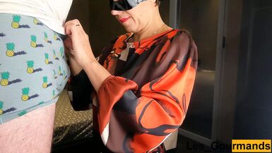 Catwoman on her knees greedily sucks a big cock and swallows all the cum without losing a drop - 1 image