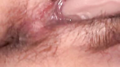 Woman masturbating with dildo