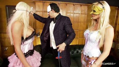Two masked blonde girls enjoy fucking with the same guy