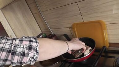 In stockings in high heels no panties and bra sexy mommy MILF Frina continues her nude cooking. Hot and cold minced meat roll on the menu today - 1 image