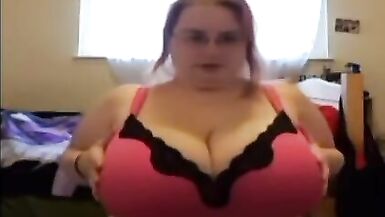 She gives herself a massage on her big tits, fat Abigail. - 2 image