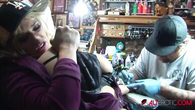 Shyla Stylez gets tattooed while playing with her tits - 7 image
