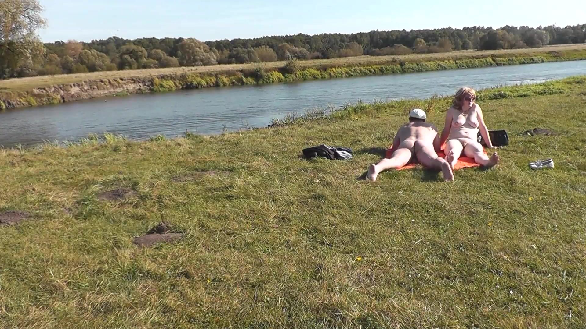 Wild Nudist Fucking - Wild beach. Nudist beach. Outdoors on bank of river lover fucks doggystyle  beautiful sexy MILF Frina. Oudoor. Ouside. Naked in public. Sex in public  watch online