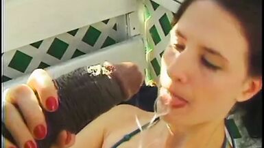 Outside, a midget and a black guy fuck a white slut - 1 image