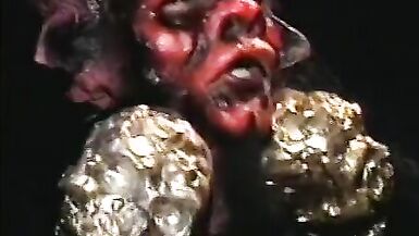 Brunette witch takes on 2 large cocks