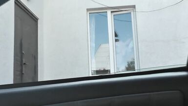 Neighbor taxi driver from window car again looks at neighbor MILF who washes window of apartment naked. Nude in public