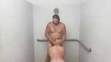 Husband and wife taking a shower with a quickie.