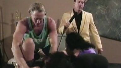 Two guys fuck two girls side by side during a presentation - 2 image