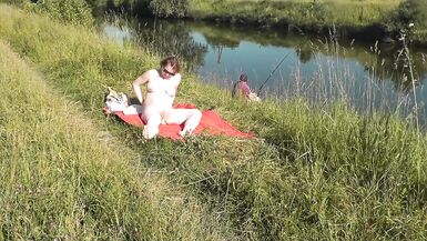 MILF sexy Frina on river bank undressed and sunbathes naked. Random man fisherman watching for her, and in the end decided to join naked woman. Wild beach. Nudist beach. Public nudity. Public exposure. Naked in public - 11 image