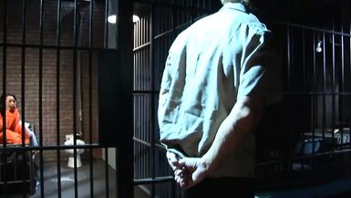 Policeman and inmate fuck in the cell