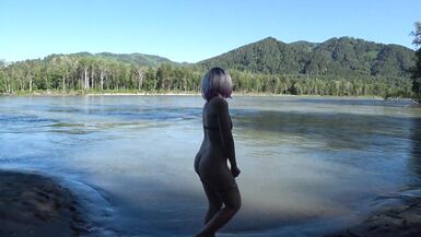 Pissing. Slim milf with big ass and hairy pussy sunbathes outdoors and urinates a lot. ASMR and nudism in a public place in nature. Amateur fetish. Would you like to spy on this mature blonde? - 8 image