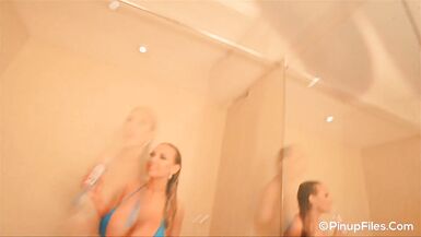 Busty Danniella Levy oils up her juicy tits in the shower - 2 image