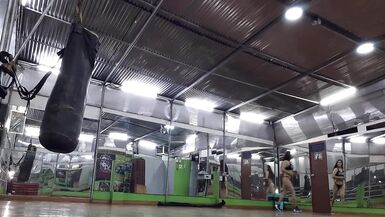 THE BEAUTIFUL MILF PERFORMS CARDIO AT THE GYM IN A THONG SHOWING HER RICH ASS - 2 image