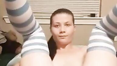 Pussy spread in blue striped socks