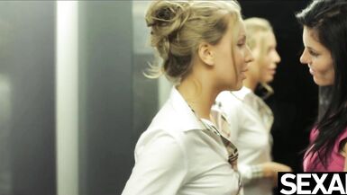 Watch these stunning girls have hot lesbian sex in an elevator - 2 image
