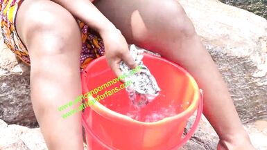 Hot and wild public fuck at the river between a bodybuilder and a neighbor during laundry in Cameroon, Africa. to see exclusively on xvideos red
