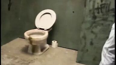 Fair-haired hottie likes to clean the bald dude's pipe through gloryhole and gets nailed in toilet - 1 image