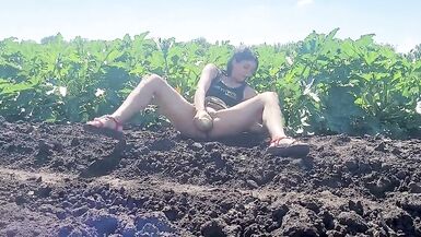 A slender brunette saw a field in which large zucchini grow, she was not at a loss and plucked a few pieces - 13 image