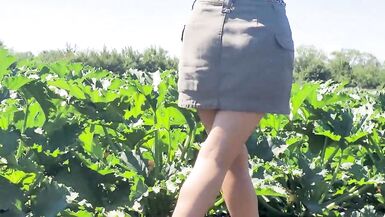 A slender brunette saw a field in which large zucchini grow, she was not at a loss and plucked a few pieces - 3 image
