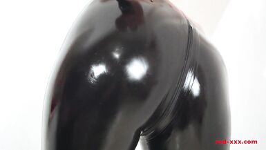 Horny housewife Red XXX masturbates in her latex pants - 4 image